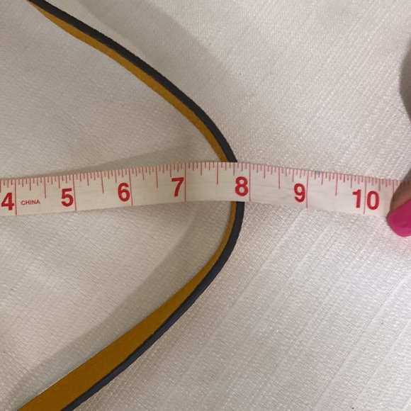 Vince Camuto Pebbled Leather Mandi Drawstring Bucket Shoulder Bag in Mustard - Picture 10 of 11